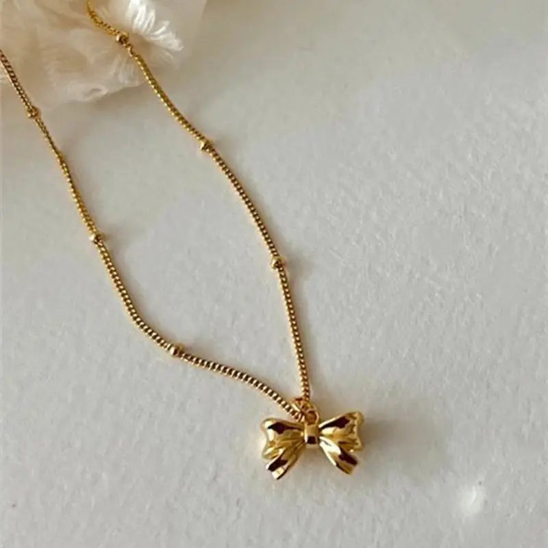Dainty Bow Tie Bowknot Charm Necklace in Sterling Silver - Gold