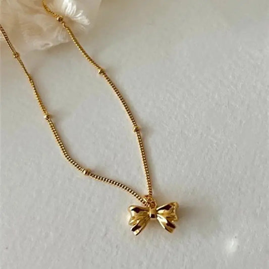Dainty Bow Tie Bowknot Charm Necklace in Sterling Silver - Gold